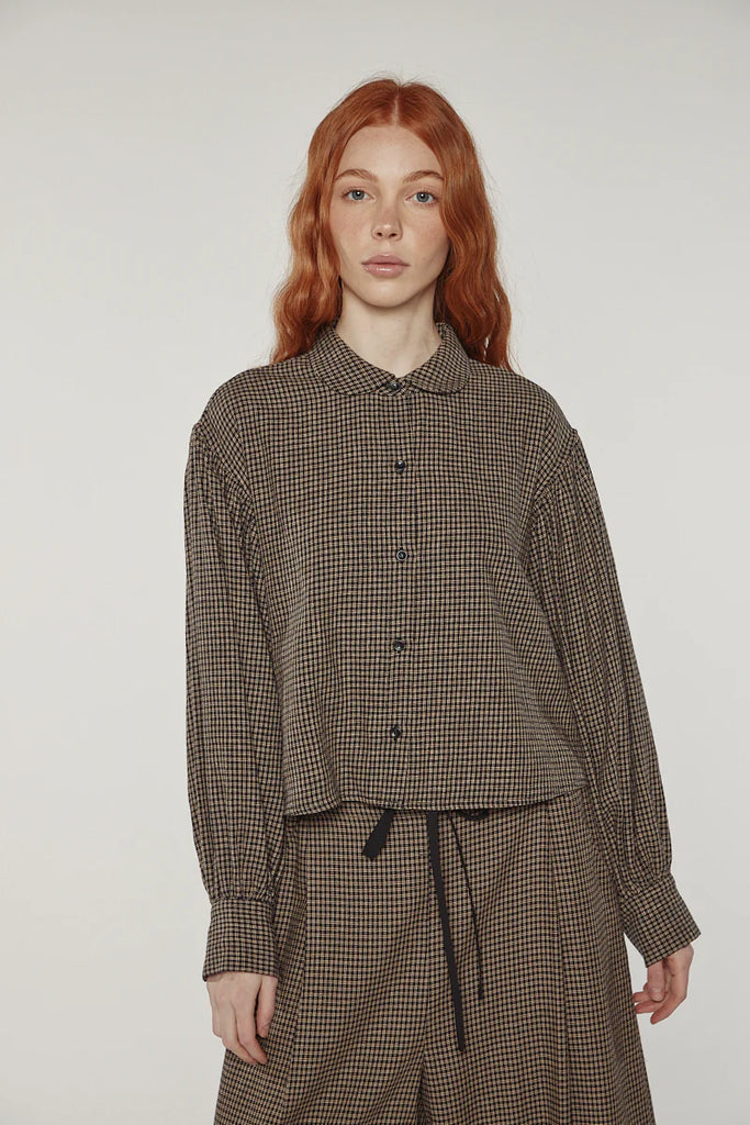 Check volume sleeve blouse