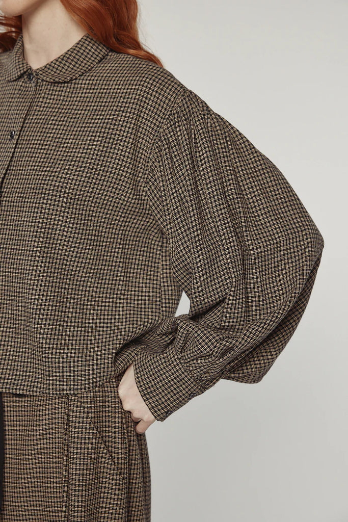 Check volume sleeve blouse