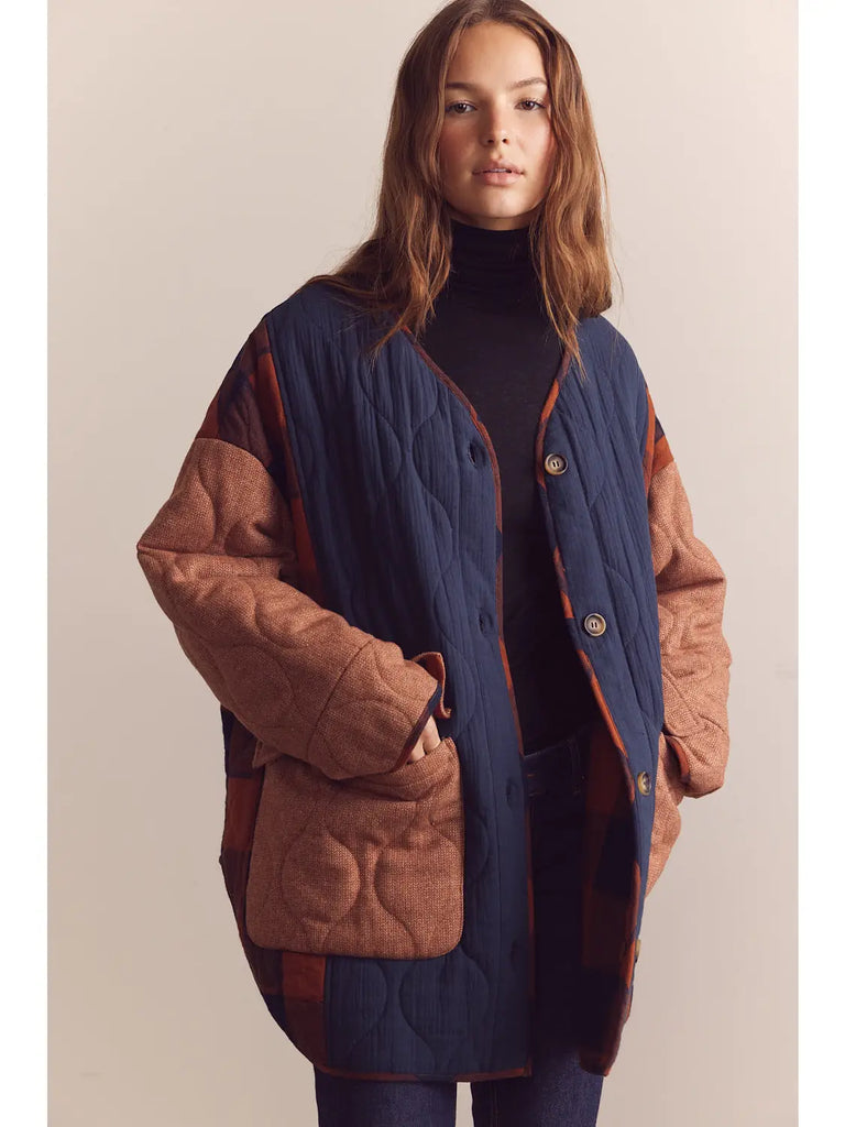 Reversible patched quilted coat