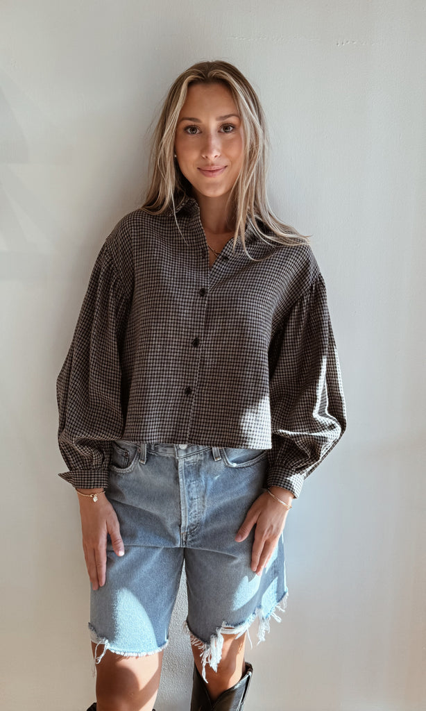 Check volume sleeve blouse
