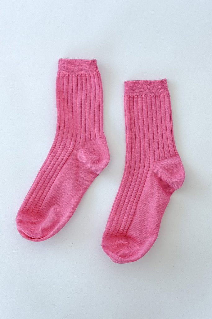 HER socks in bright pink