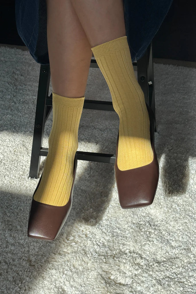HER socks in buttercup
