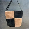 BLACK + BROWN SHEARLING BUCKET BAG