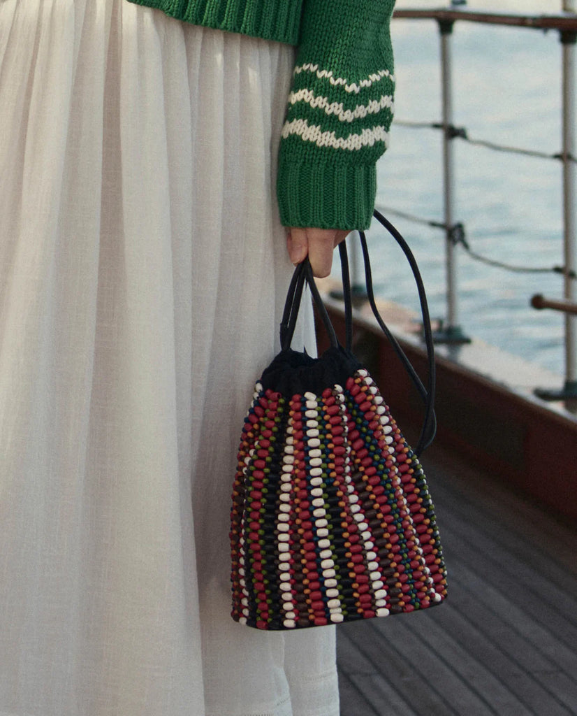 The Beaded Cinched Bucket Bag in Cabana Stripe